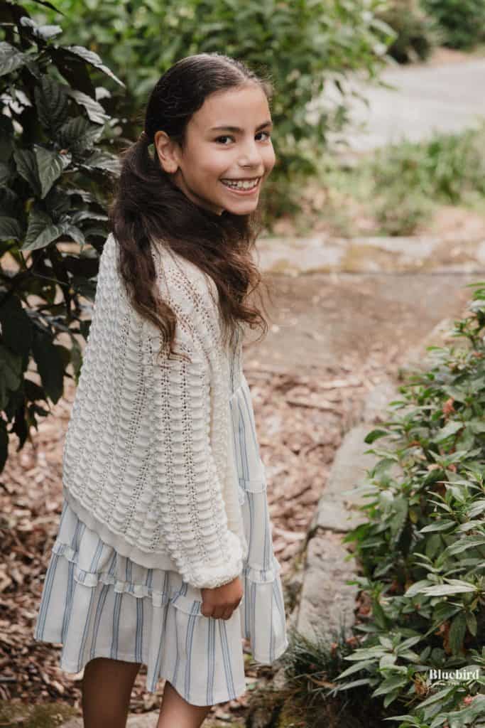Taking photo of playful child in Sydney by Bluebird Photo Studio